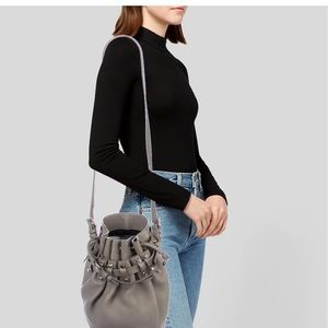 Taupe grained leather Alexander Wang Diego bucket bag with gold-tone hardware.